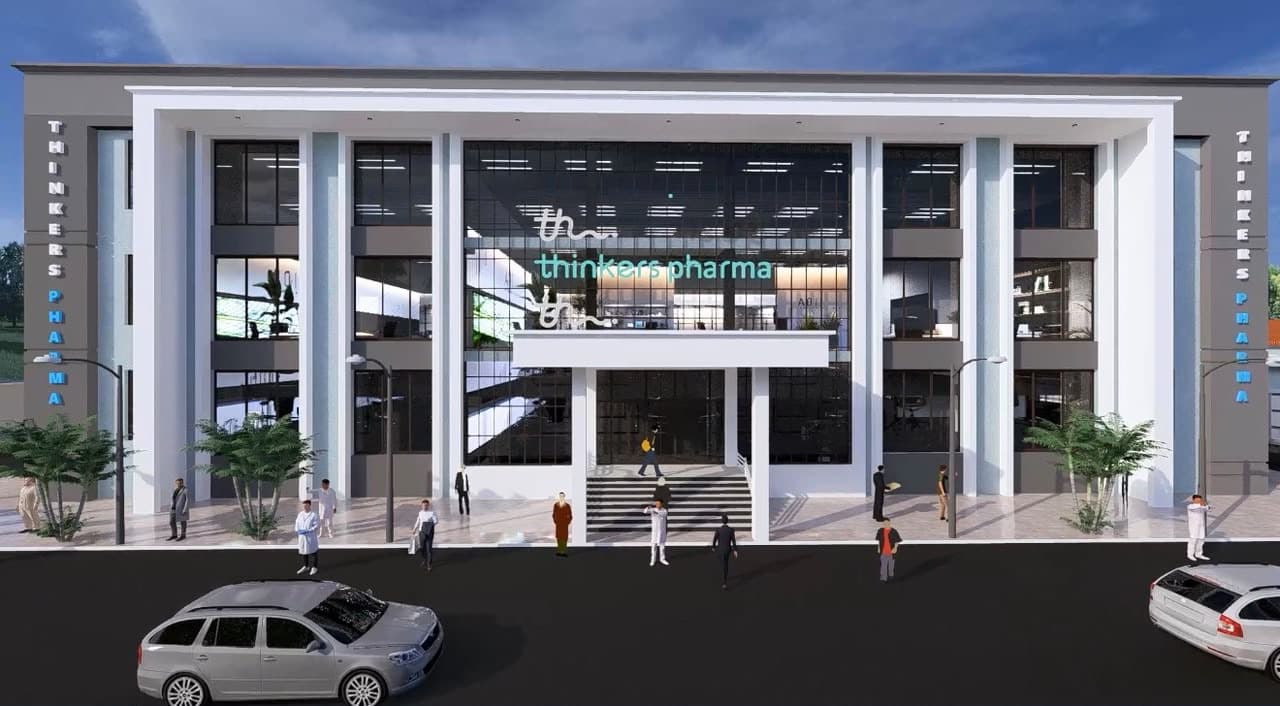 Design rendering of the Thinkers Pharma manufacturing building, with the Thinkers Pharma name on its front